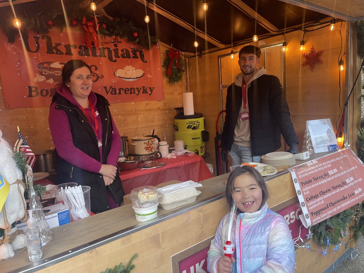 nobleidea's tweet photo. Found the tasty Ukrainian varenyky booth at the Seattle Christmas Market.  Don’t miss the Lviv-style poppyseed cheesecake. 💙💛 https://t.co/ijdegH3JFo