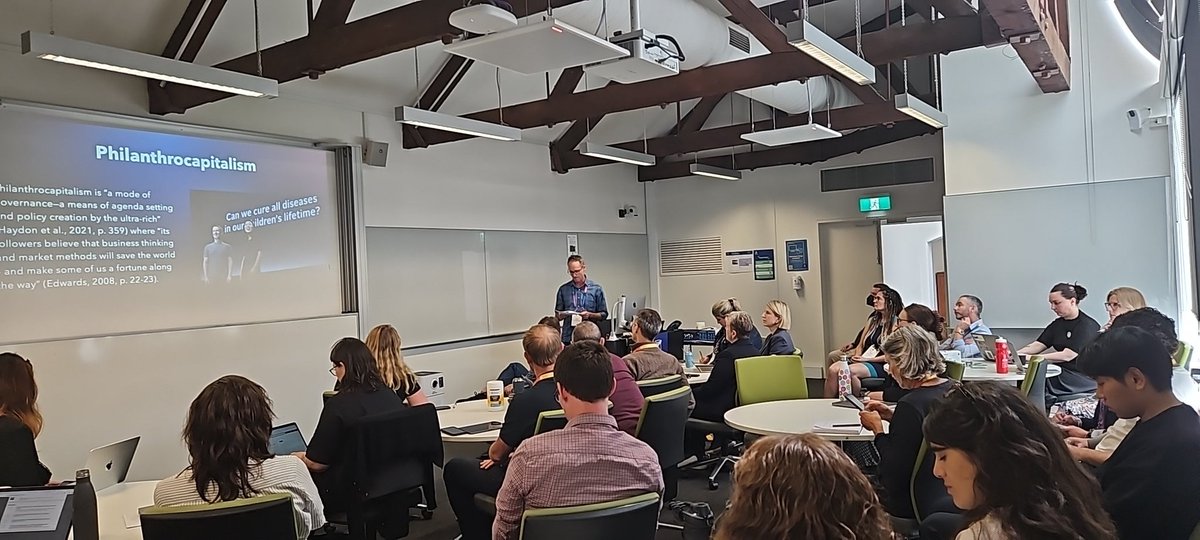 A full house for session two (day one) at #aare2023 Darren Powell prompts us to consider the extent of influence that notions of charity and philanthropy have on the governance of school, health education, teachers and students.