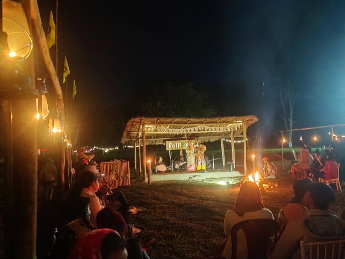 A celebration within a vibrant tea garden, with a backdrop of the stunning Gorichen range in Eastern Himalayas. Minimal lighting; just kerosene lamps &amp; tea-light candles to gently illuminate the venue under the full moon. Microphones are adjusted to a low volume, reaching ++++