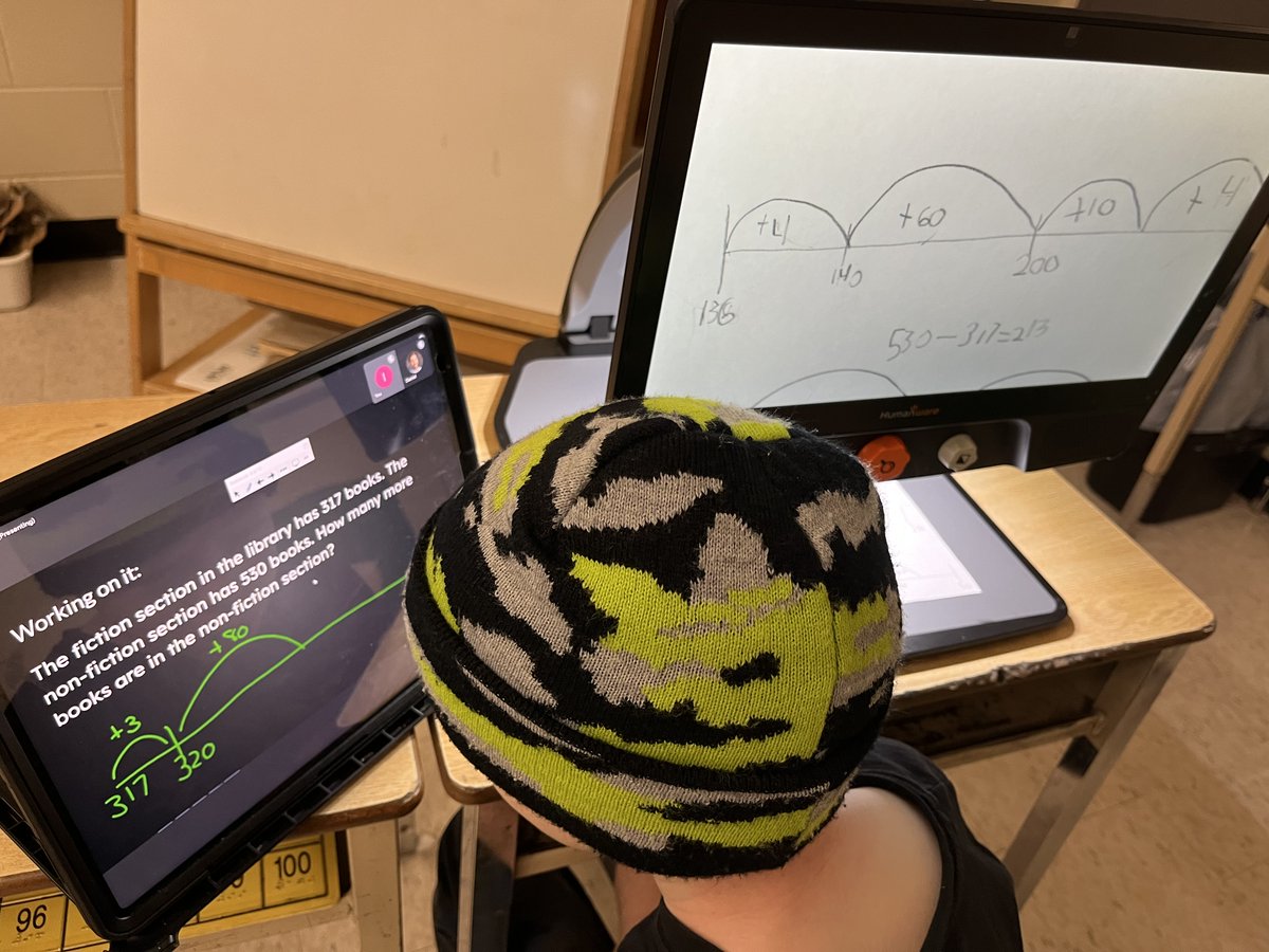 Just a regular Monday at <a href="/MACEaglesLondon/">Sir John A Macdonald</a>... numeracy made accessible by the SmartBoard shared to an iPad via a Google Meet. Written work made accessible via a CCTV.
Expensive? Yes. But every kid with a visual impairment has the human right to learn alongside their sighted peers.