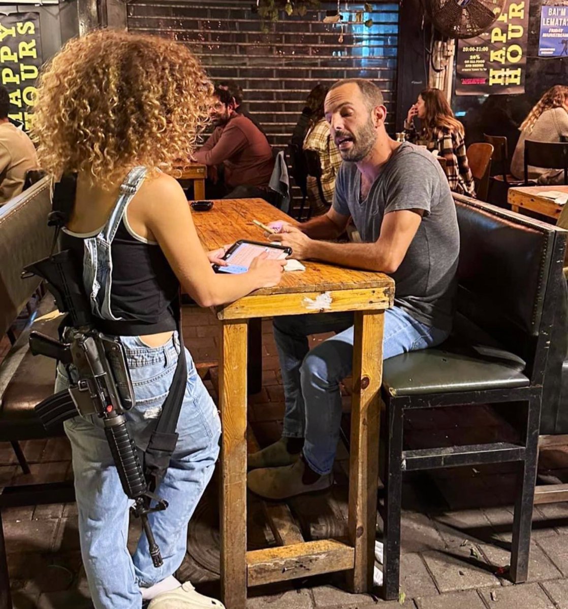 canadausaausuk's tweet photo. A waitress taking orders in Tel Aviv.

Very normal considering Hamas terrorists coming for innocent civilians &amp; committing massacres.

#HamasTerrorists #HamasisISIS #HamasislSIS #Hamas #HamasNazis #HamasTerrorrists #Israel #IsraelHamasWar #Gaza https://t.co/imyhgHKrvG