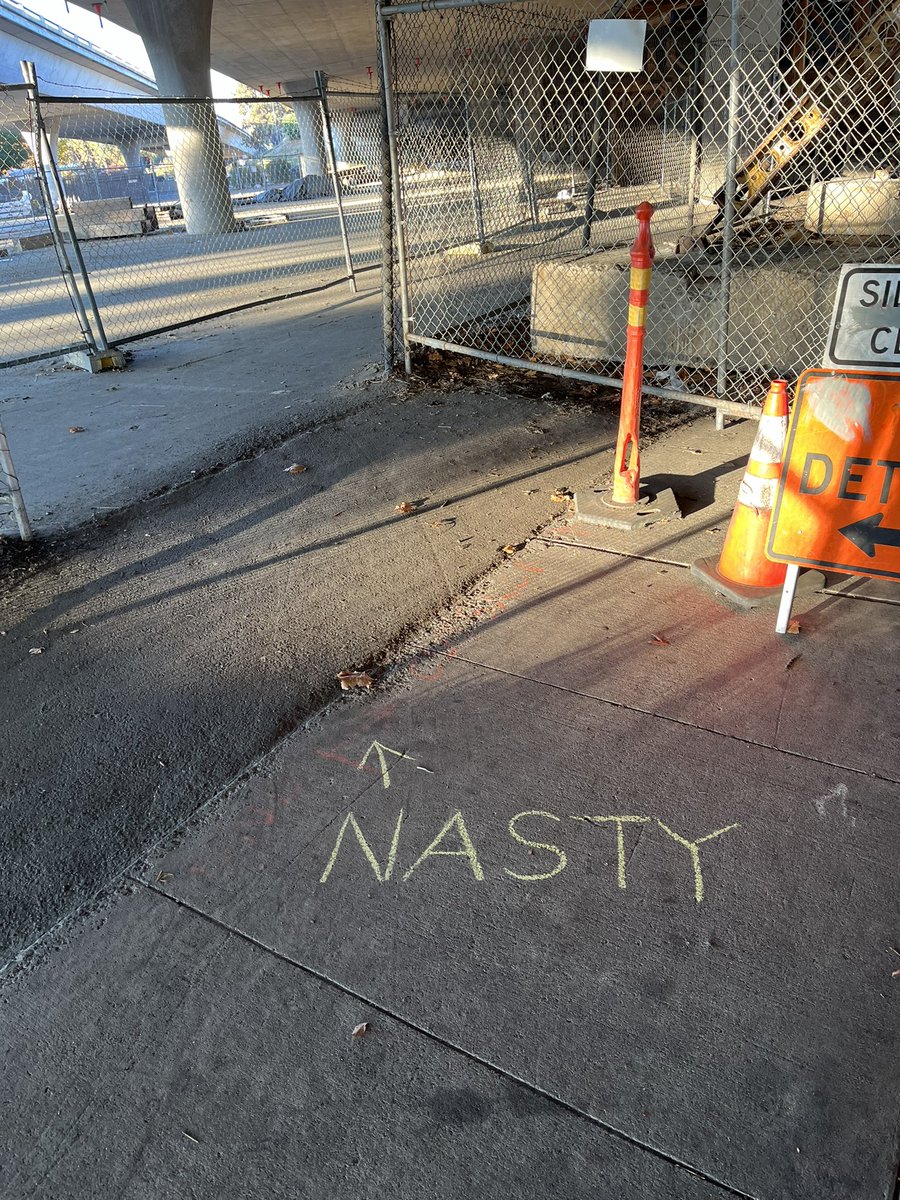 nerd42power's tweet photo. @flatironcorp @TheCityofSac T and 34 is disgusting again.  Smells really bad too. Flat Iron, I hope you roads are better maintained than you job sites. Someone labeled the pedestrian tunnel to let people know before entering. https://t.co/CMimJFWB8S