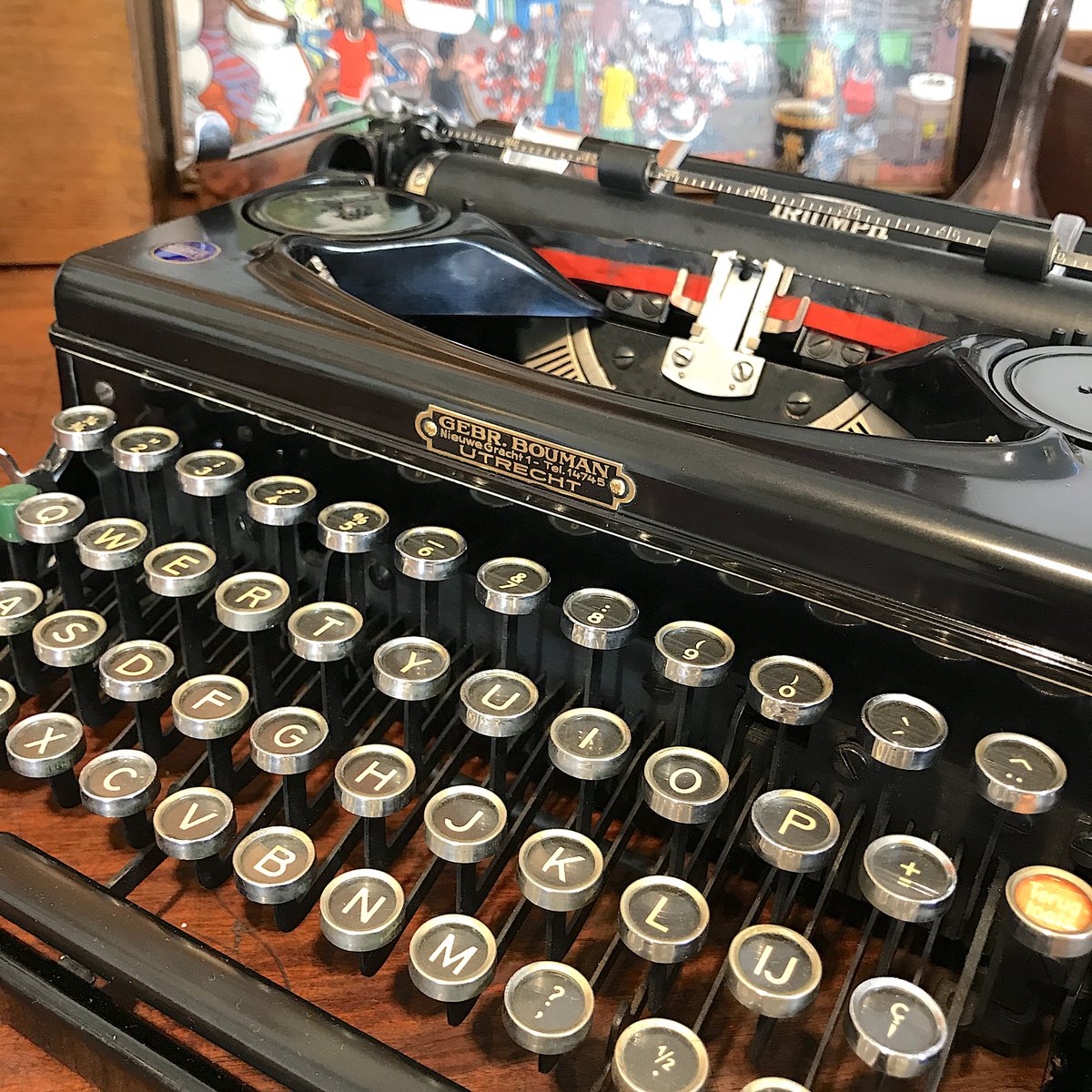 acme_type's tweet photo. A fine and rare Triumph Norm #typewriter. From 1943, in the middle of WW2, it is unusual in the QWERTY keyboard. Despite the war, non-German (QWERTZ) keyboards were produced for export, primarily to German-occupied Netherlands. This one was owned by a merchant in Amsterdam. https://t.co/jR5MOmYdbv