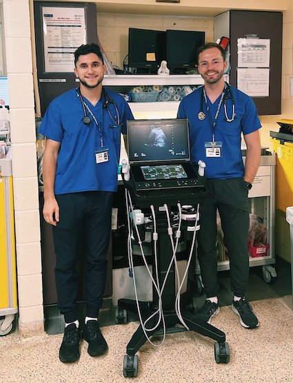 Hamza and Darwin learning the basics of POCUS during a scanning shift! #practicemakesperfect. Thanks to Dr. Hamza Shogan for this photo. See all entries at tinyurl.com/4s9w8xwe