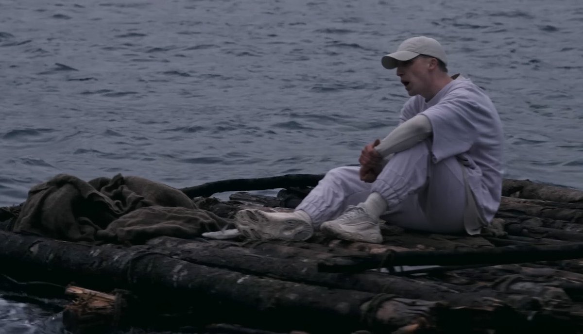NFcommunityNF's tweet photo. Hidden messages and Easter Eggs in HOPE:

Hope begins seeing NF “Drifting” in the ocean. Following the outro of The Search Trauma “Grab my hand, I’m drowning, I feel my heart pounding, Why haven’t you found me yet?”. Showing that Hope has finally found Hope.

He begins with how the old NF has had his chance to help him and still hasn’t gotten better so now it is “Hopes” turn. 

When he goes to introduce his album, you can hear all of his emotions trying to fight for whose album this will be “My Album”. 

“HOPE” announces his entrance by referencing “What your definition of success” but this time changing it to “What is my definition of success” and finally answering the question. 

You can also see the Paddle from “Lost” that he pics up on the raft he was drifting on. 

You can also see that this film is much brighter than his other ones where there was a slightly greenish tint to where there is only brightness in “Hope”. 

You can also see NF finally has the “map to Hope” that he has been “Searching” for. 

We also finally see “Hope” meeting the older version of NF and see that he is leading him in different directions. He is lead back to the beach where the older version of himself has lead him in a circle

We hear the music starting to get darker as “Hope” is mentioning all the time that was wasted. but gets interrupted when he says “Pretending I was in” and once he was about to say (Mansion) we see the older version of him push him into the mansion yelling “They Get It”

He then gets pushed inside his mind where we hear “Mansion” begin playing. While also seeing the balloons from perception and the shopping cart from the search. 

The only other video we see NF talking to himself is “Therapy Session” which has been more than 6 years ago. 

We see him enter a room filled with balloons which I believe he referenced in “Mansion: This rooms full of regrets, it just keeps getting fuller it seems”

We then see him walk into a room with the older version of him from “Perception: Let You Down” locked in the cage from “Outcast”. 

Hope slowly begins to back away when the old NF puts a bag over his head. Which he has referenced in many songs

We see him take the bag off his head and mentions how he finally forgives his mom and he references “I ain’t gon’ say I forgive you cause it hasn’t happened, How Could You Leave Us”

We then hear Hope list off everything NF has been suffering through for the past 30 years while the old version tries to interrupt him yelling “HEY, NATE, WAIT”

We see them fighting for who has control over NF with the older version yelling “You’ll never evolve” referencing to “Clouds: Calmly feel myself evolving” and “Lost: Told me I could never evolve”

At the very end we see Hope take the reigns where he has mentions in a few songs including “Lost”

Now my reasoning for using “Old NF” instead of “Fear” is because we don’t know which emotion this is. The main emotions are Fear, Anger and Pride. Many think that “Running” is showing that he is done with his old self. He never mentions Fear or Anger. He says “Of holding on to you, it's time to let
My pride, Go and learn to love myself again”. There are still 2 emotions left. 
We still have not heard the song referenced in “Intro 3: I wish I was buryin' anger
But both of us know I'ma need him for that song (that song), he still lives in the basement”
In “Happy” he says “I got some issues that I won't address
I got some baggage I ain't opened yet
I got some demons I should put to rest”

NF does have “Hope” but we saw that he has the map and still doesn’t know where to go. He just found the map so he still needs to get to where the map leads. Clearly these other emotions are wanting an album too..  

Yes we all know the NF journey, but we just found the map to Hope. It’s not that simple. The real journey has only just begun..