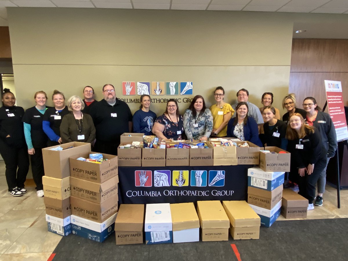ColumbiaOrtho's tweet photo. Employees at Columbia Orthopaedic Group packed 28 boxes full of Thanksgiving goodies so 28 families can have a nice Thanksgiving next week thanks to Love Columbia. Well done, everyone! #communtiyservice #Thanksgiving #helpingpeople https://t.co/1DuIZcSOyo