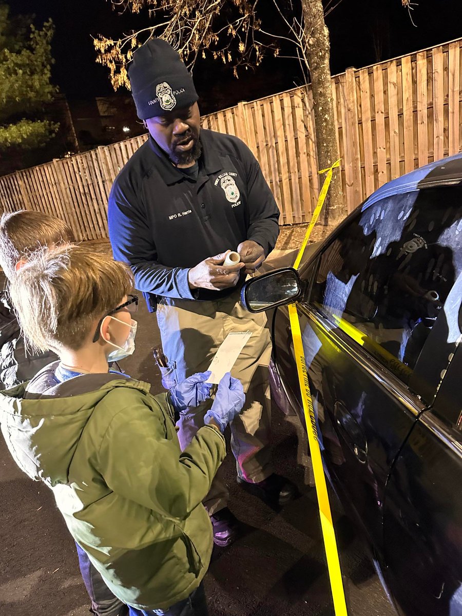 PWCPolice's tweet photo. #CommunityEngagement Ofc. Harris affirmed a new group of #PWCPD junior detectives last night. #ScoutPack 107 did a great job identifying a suspect &amp; collecting evidence during the mock investigation. Thanks to Fleet Coordinator DeBriae &amp; FSGT Szalach &amp; K9 Apollo for helping out. https://t.co/y6RNIzJcFI