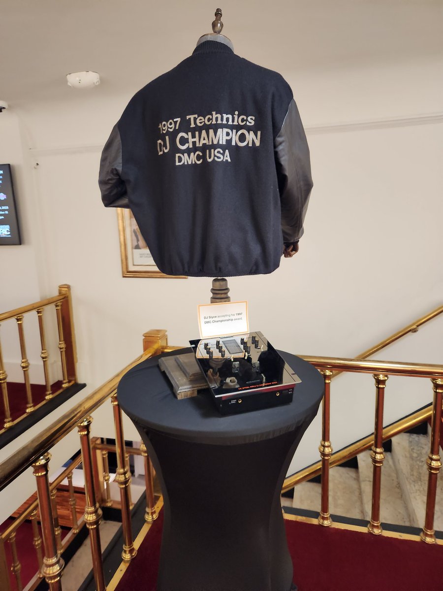 Teddytedd's tweet photo. DJ Slyce 1997 DMC Championship jacket and mixer at "Hip Hop 50th Bergen" #awesome2 #bigbub #RockandGee #kdefandlarryo #Redheadkingpin #DjSlyce #BreakOutBrothers #SoundonSound #phase2 #bossbill #showbiz etc https://t.co/JhVmfM8yCa
