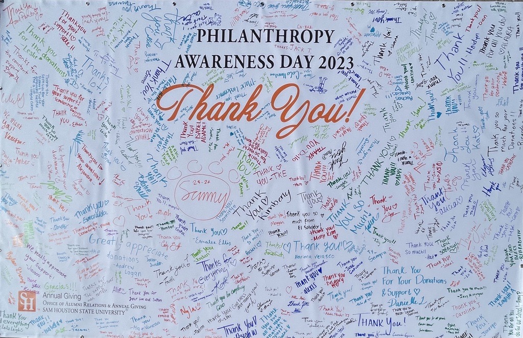 SHSUGiving's tweet photo. Today we celebrated National Philanthropy Awareness Day in Parker Plaza! Students, staff, and even Sammy signed a banner saying thank you to our donors that do so much to support our university.Thank you to everyone who stopped by and participated with us another year. 🤩 https://t.co/VeLj7zFO9T