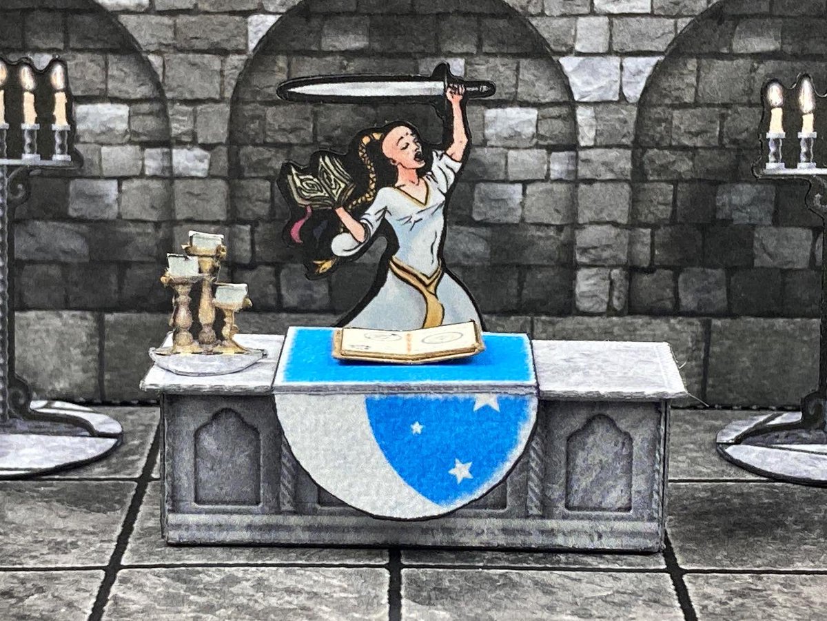 paperrealms's tweet photo. Some @BraveAdventure5 minis in Paper Realms terrain for inspiration. While the Sisters of the Blue Moon ready for battle against some shapeshifting demons, Sister Ildrid explores a corner of the archives desperately looking for clues as to how to defeat their daunting foes! https://t.co/Zu98SSejHJ