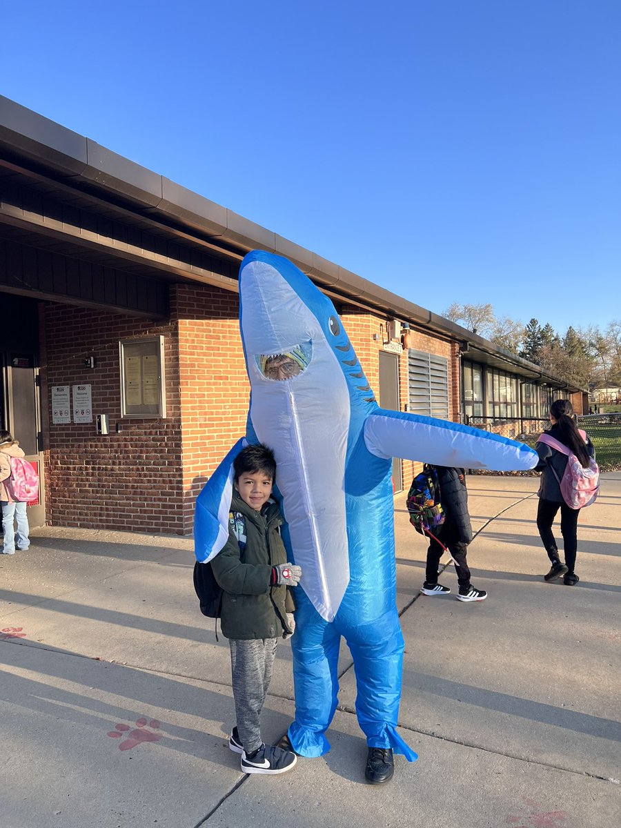 Clark the shark was out and about this morning making sure kids walked in safely this morning!