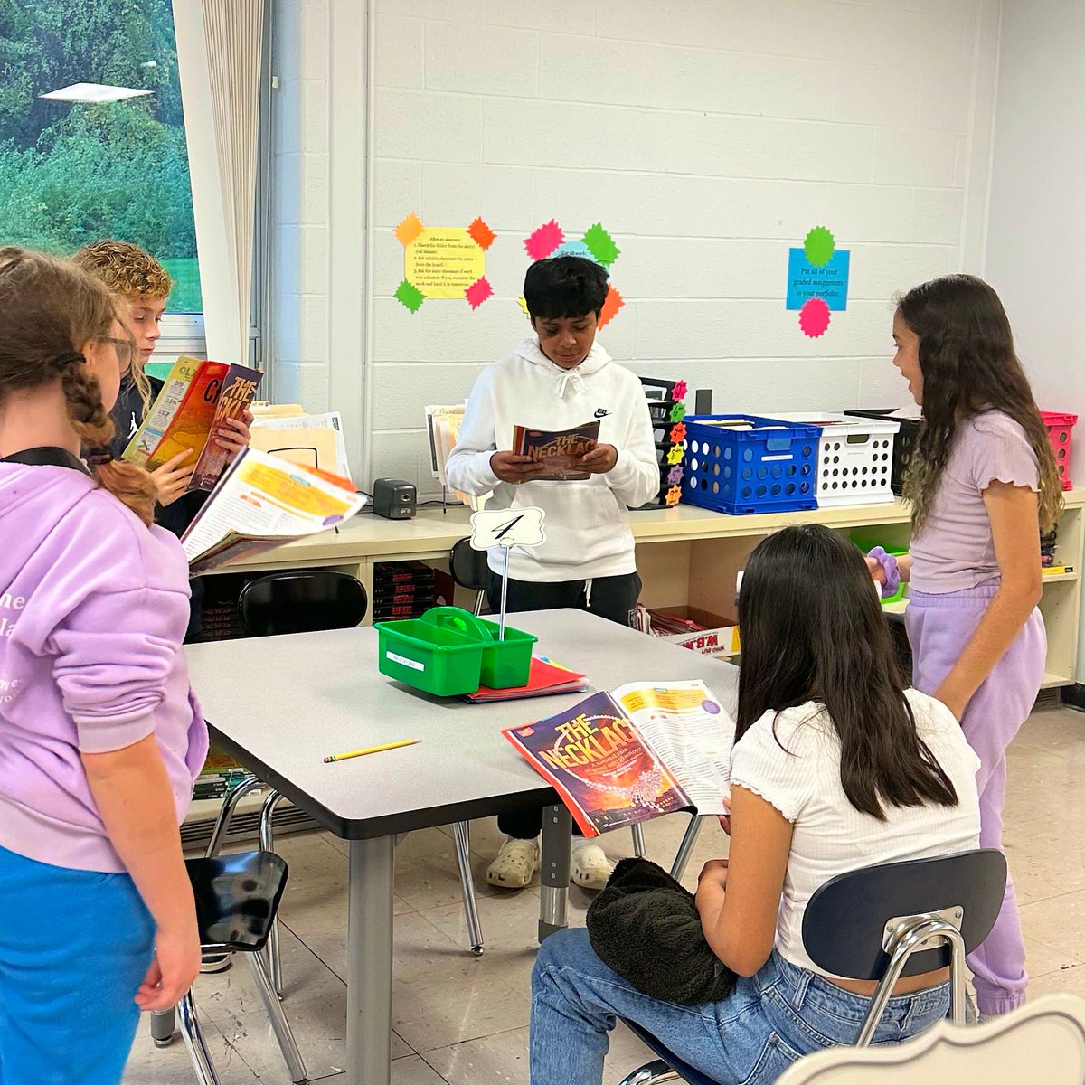 MillbrookCSD_NY's tweet photo. Two heads are better than one in Ms. Guley's seventh grade ELA classes, where students are practicing reading fluency with partners! The goal is to work together to become stronger readers and gain a deeper understanding of what they read. #MCSDMethods #goblazers https://t.co/XUTCYltDom
