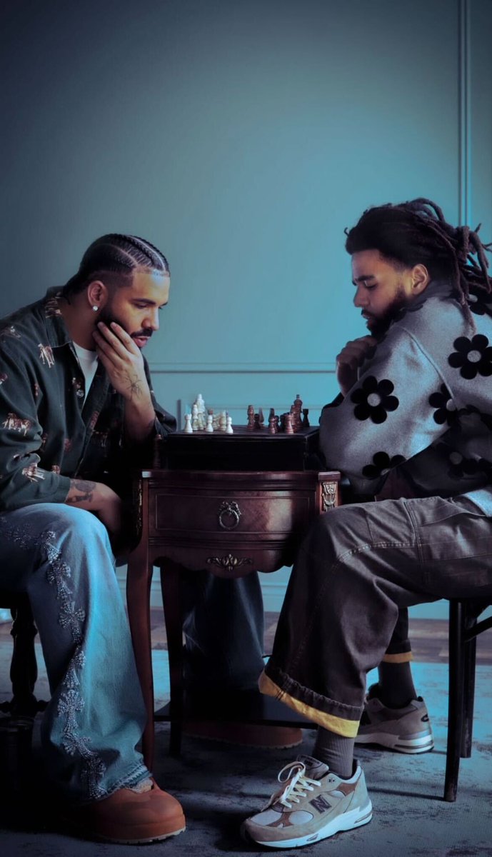 Drake & J. Cole recreated Messi & Ronaldo chess match photo for
