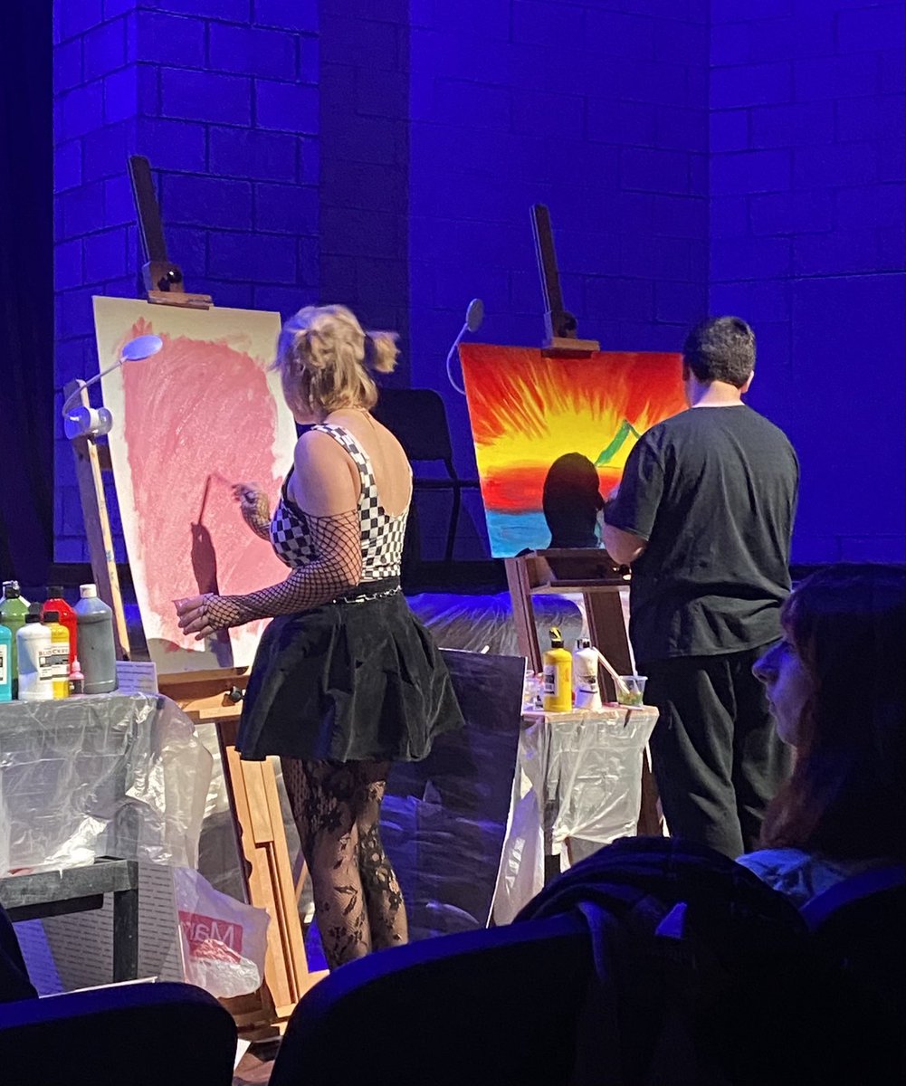 kd_buller's tweet photo. And all the while the stage is on fire with talented sound, these artists fee and convey their thoughts on blank canvases. Profound! ⁦@avoneagles⁩ ⁦@ben_hodge⁩ ⁦@AvonLocalSch⁩ https://t.co/uAap5iv3lr