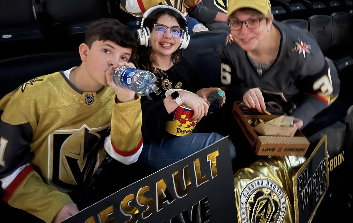 lifetime2go's tweet image. In a sea of red, we rooted for our own @GoldenKnights, with home made signs in what has become an annual family tradition since moving to Virginia.  Tough loss, but we stayed positive. #GoKnights #VegasBorn