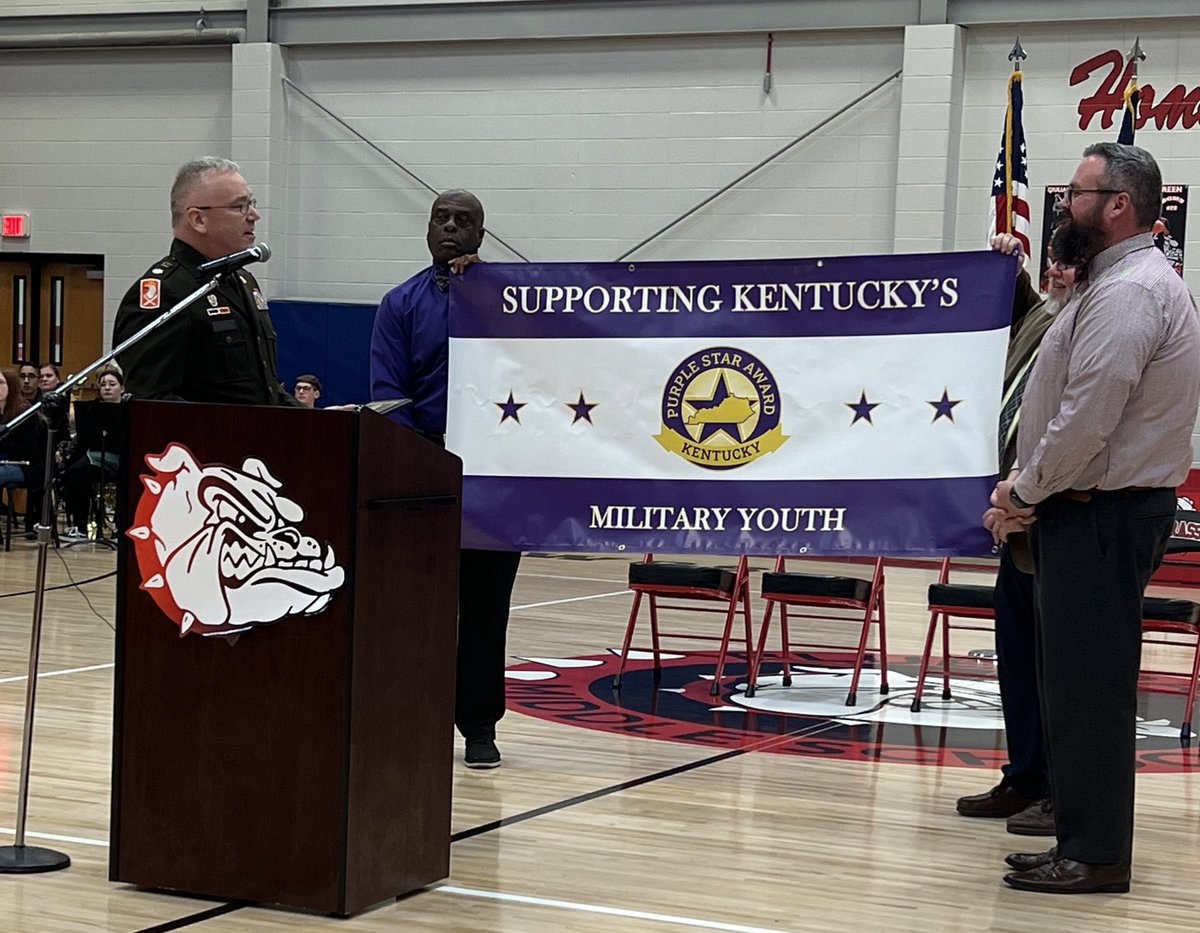 BluegrassDawgs's tweet photo. Lt. Col. Sean McNichol presented the Purple Star award, an award designated to recognize school districts and schools that demonstrate educational and social-emotional supports to students of military service members.
#UnleashExcellence #purplestar #HCSStrongerTogether https://t.co/WxSAp3k4Kv