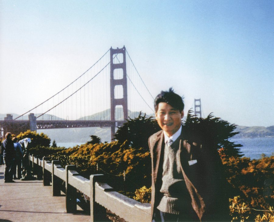 File photo of Xi Jinping visiting San Francisco taken in front of the Golden Gate Bridge in 1985.