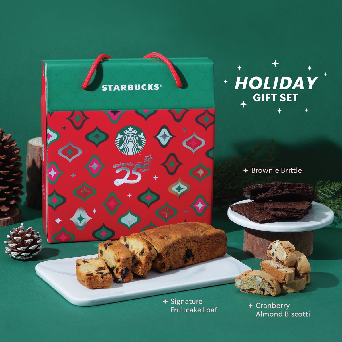 Savor the season with our Holiday Gift Set! 🎁✨ Indulge in the delightful trio of Brownie Brittle, Cranberry Almond Biscotti and our Signature Fruitcake Loaf. Unravel and share the seasons with one delicious bite at a time! 👨‍👩‍👧‍👦 #StarbucksMalaysia #ReimagineYourHoliday