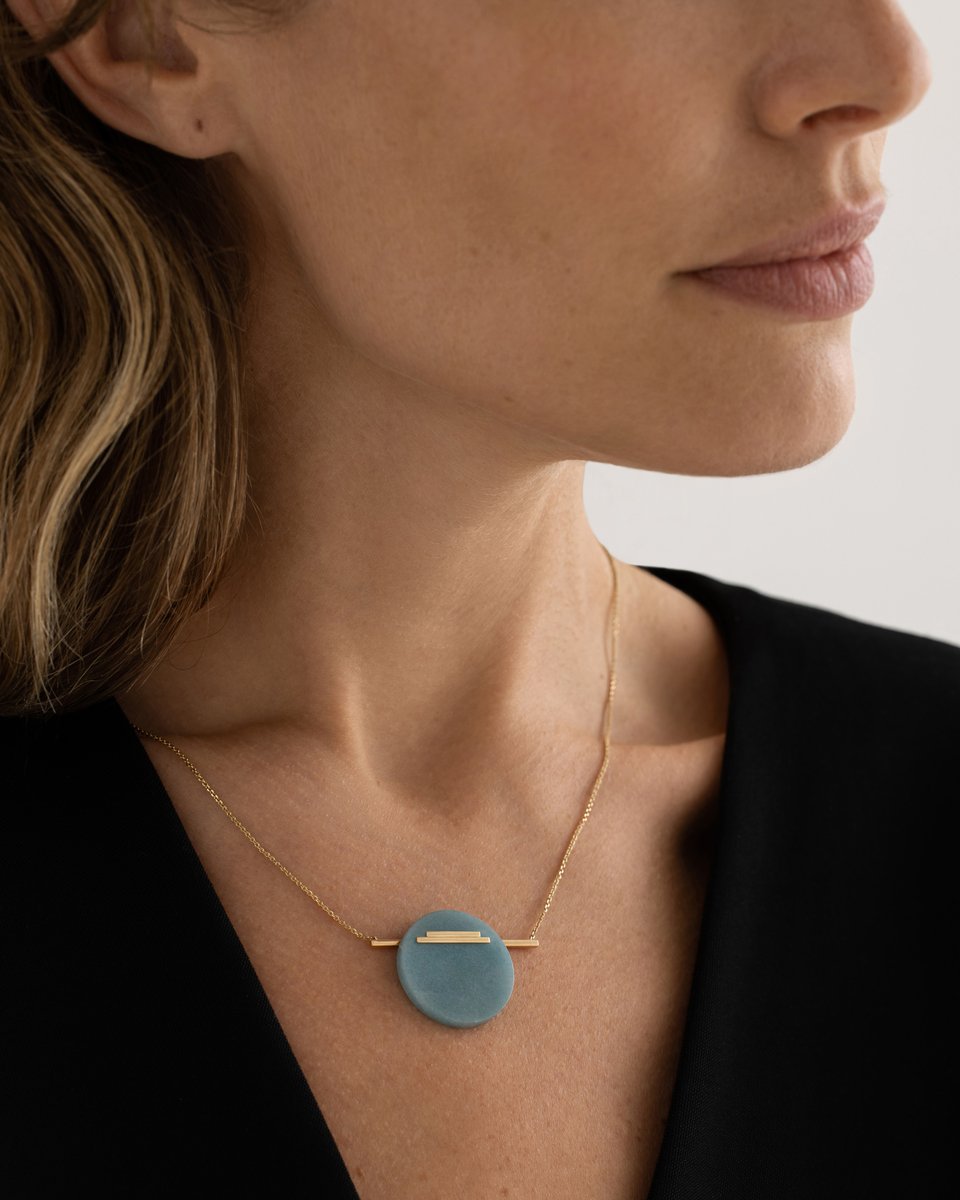 letajewelry's tweet photo. A perfect circle shape became the centerpiece of this Una necklace. Sky blue quartz with peculiar inclusions intertwines with a thin golden line as if a circle was pierced by it on the fly.

The necklace was created asymmetrical. It changes its angle on the neck with every move. https://t.co/CoiEML1MBs