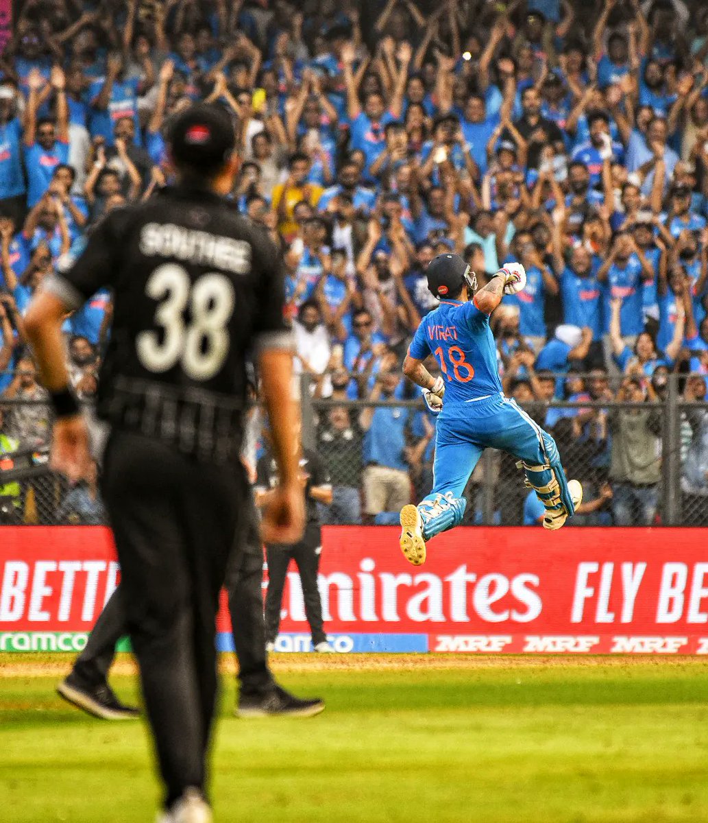 ck_thanseer's tweet photo. Virat Kohli of India celebrates after scoring a century, overtaking Sachin Tendulkar for the all time most ODI centuries during the ICC Men's Cricket World Cup India  Semi Final match between India and New Zealand at Wankhede Stadium .Photo @ck_thanseer https://t.co/uXpuleAe1V