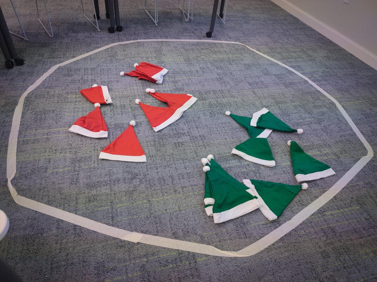 Nic__Allen's tweet photo. Feeling festive 🎅Teaching ionic movement during an action potential by using 20 students, Santa hats and masking tape to make a giant neuron. @BrightPhysios @BrightonLTHub https://t.co/hcDUmj0GS7