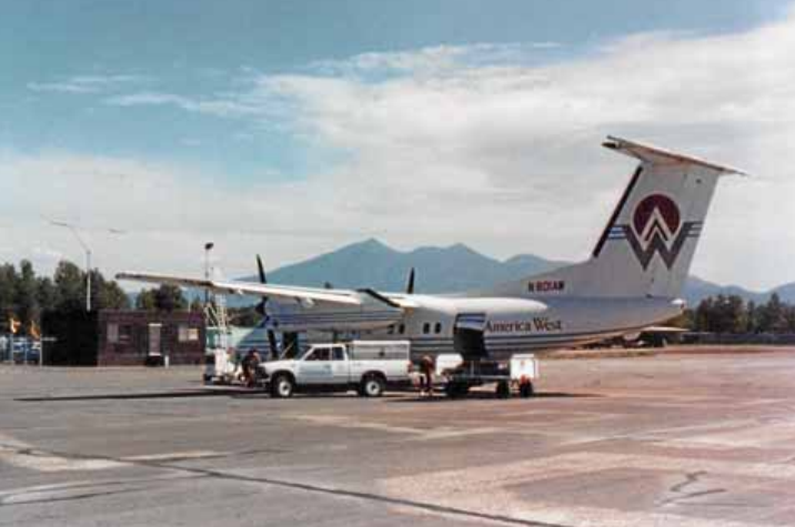 🎉 Celebrating 75 years of service to Flagstaff! Let's throw it back to the America West days. Can you identify this aircraft? Comment below for a chance to score some awesome FLG swag! ✈️ #FlyFlagstaffAZ