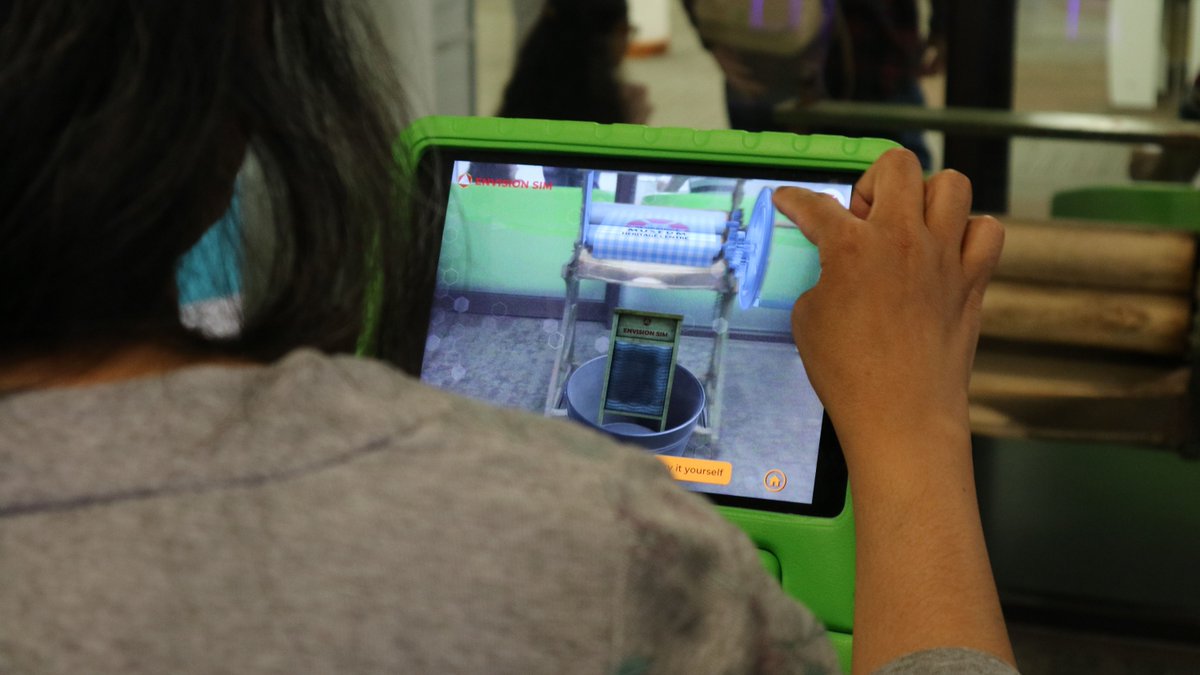 RedbridgeMuseum's tweet photo. For today’s #Museum30 theme of Technology, here’s a throwback to our exciting Augmented Reality activity at last year’s @RedbridgeLibs #TechIlford festival. Visitors looked into a specially-made app to find out how our Victorian mangle functioned. #ThrowbackThursday https://t.co/zHBblz9T2s