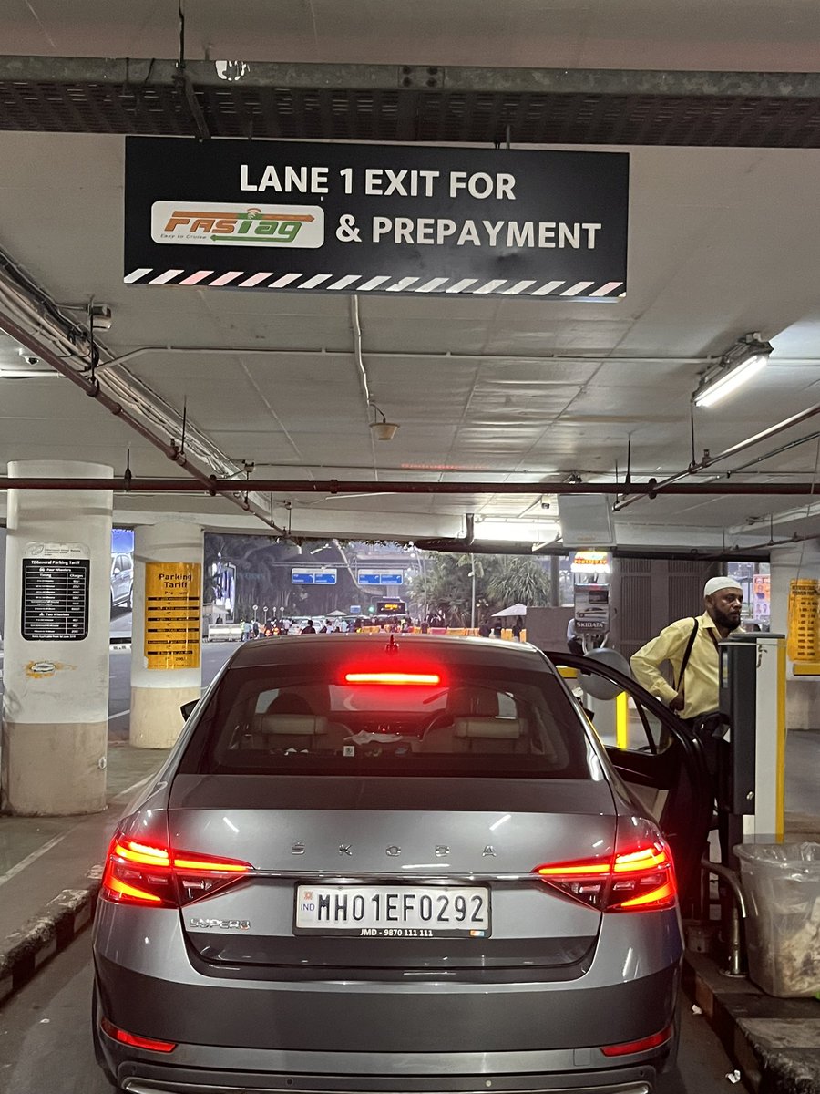 HiRajnish's tweet photo. @NHAI_Official @fastagofficial Why Parking goons at Mumbai airport don’t collect parking charges thru FASTag and insist on paying through their slips, saying machine is out of order every time, when one can very well see the FASTag scanner light on. Whose pocket is my parking money going into ??? https://t.co/0COMeV5Alr
