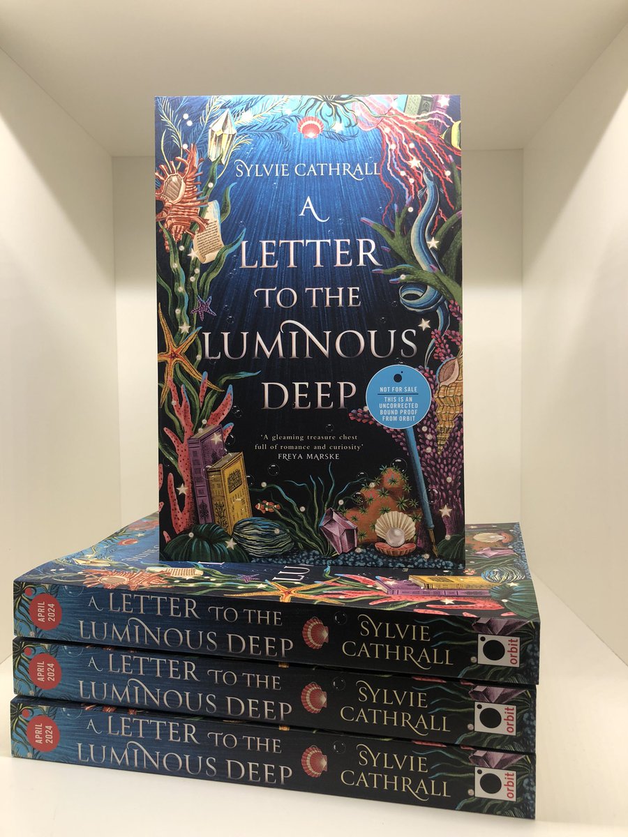 Beautiful ARCs of A Letter to the Luminous Deep have arrived in the office. This book has my whole heart. 

🐚 Romance of manners 
🐚 Magical academia
🐚 Pen pal romance 
🐚 Found family 
🐚 Cosy comfort read