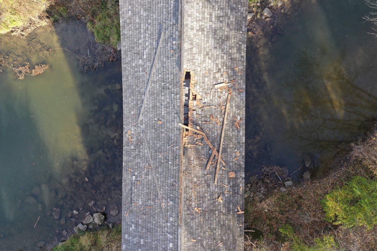 I'm shocked &amp; sadden to photograph the scene of the Red Covered Bridge this morning. I hope it will be rebuilt but it will never be the same. The iconic 149-foot bridge was built in 1863. On April 14, 2021, Today's damage was lot more severe than the last semi  incident in 2021.