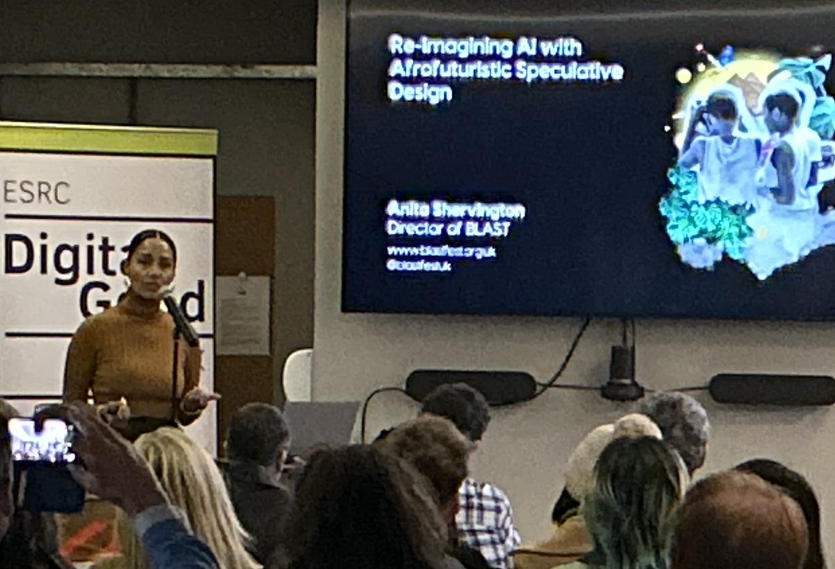 Sharing her experience so far, @AnitaShervingt1 (Director of #BLASTfest) talks about her project (funded by the Digital Good Research Fund) about 'Re-imagining AI with Afrofuturistic Speculative Design'. #inspiration for some future projects in #birmingham? #digitalgood @ESRC