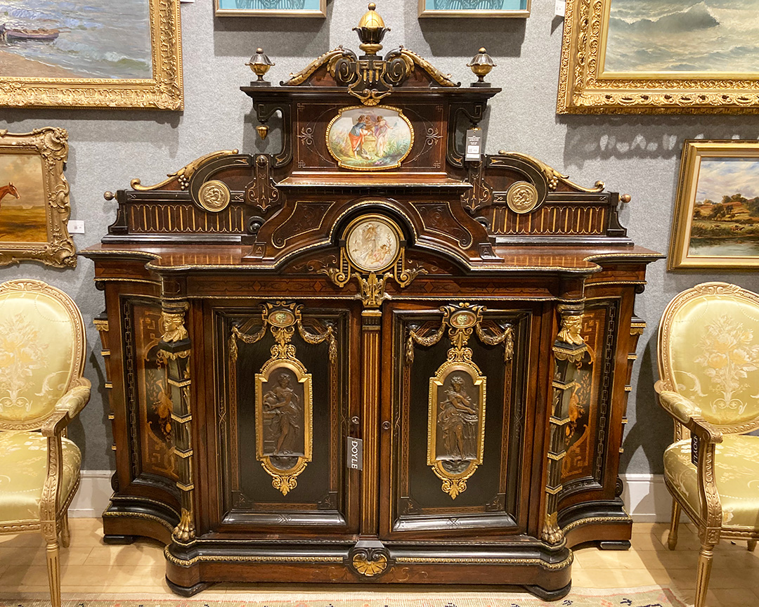 The opulence of the Belle Epoque is reflected in this elaborately decorated rosewood cabinet attributed to the New York firm of Pottier and Stymus, who provided furnishings to New York’s Gilded Age elite. Auction 11/21. Place bids at Doyle.com