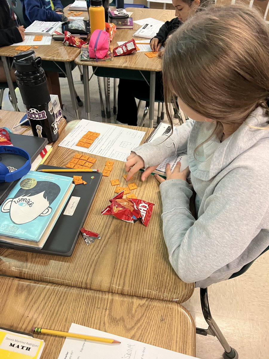 CedarForestES's tweet photo. Mrs. Delaney’s 5th grade class exploring area and perimeter with Cheez-it’s.🐺 https://t.co/VOPolKuRQg