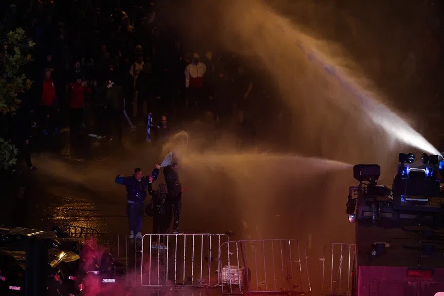 shumanskoo's tweet photo. Mad scenes in Sofia outside the National Stadium where Bulgaria plays Hungary behind closed doors: clashes between fans and police forces, water bombs and cars set on fire… https://t.co/KcIU1Foskd