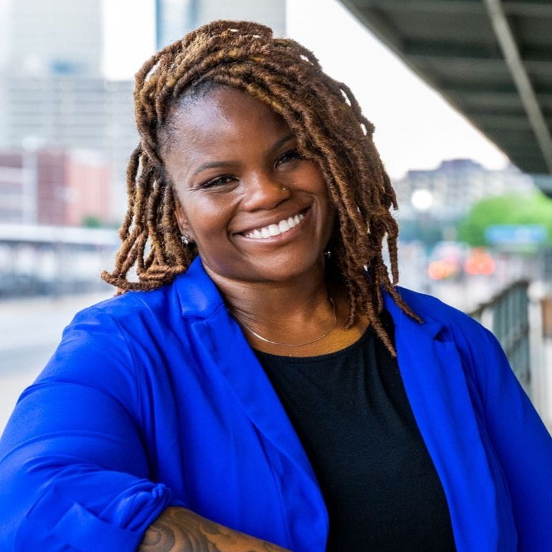 UTArlington's tweet photo. Through a multi-million dollar federal grant, a UTA researcher aims to bring new voices and perspectives to artificial intelligence creation.

-

I.D.: A linked image of Assistant Professor Ericka Roland standing outside UTA Fort Worth that leads to the UTA news release.