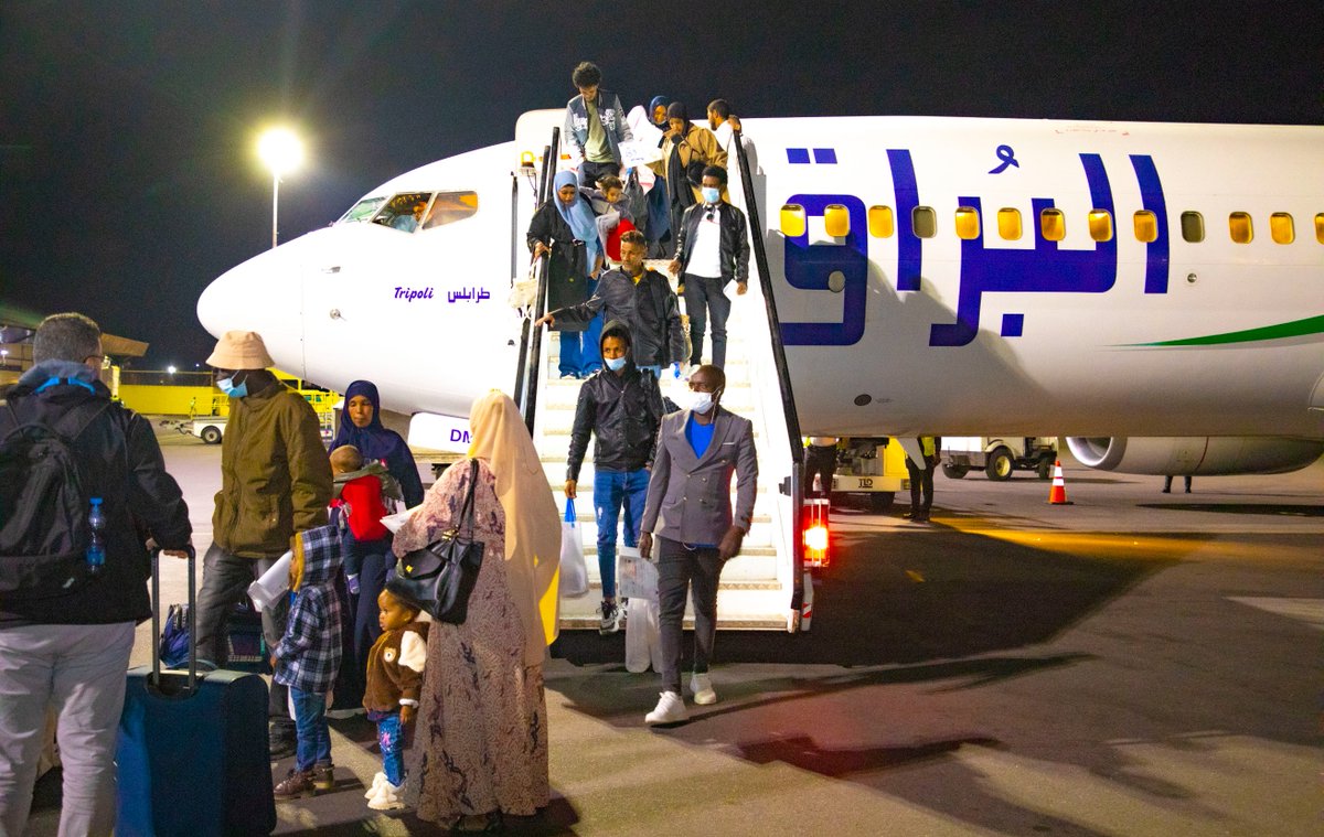 RwandaEmergency's tweet photo. Tonight, in partnership with @Refugees, Rwanda welcomed 169 asylum seekers from Libya originating from Eritrea, Sudan, Ethiopia, Somalia &amp; South Sudan. They safely landed at Kigali International Airport.
Rwanda remains committed to offering refuge &amp; assistance to people in need. https://t.co/0uUJTvCyHH