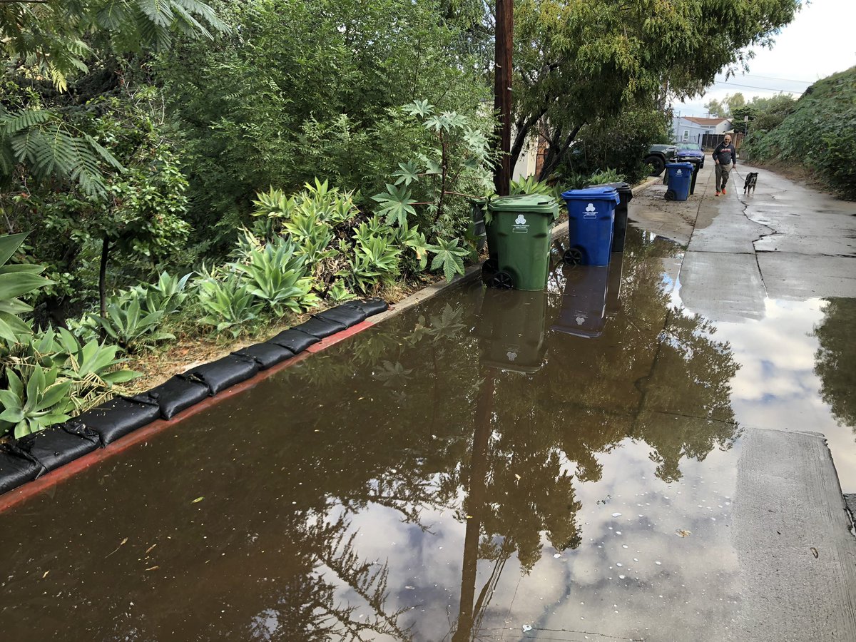 LarsGruber's tweet photo. A little rain and the 1600 block of Easterly Ter is flooded. Waiting over a decade for a fix. Good thing for my neighbor I sandbag. When repaired is a mystery. Would @EricEarly_CA fix faster? @BSSLosAngeles @CD13LosAngeles @RepAdamSchiff @KTLANEWSDESK @ABC7 https://t.co/dWtPfxXUzi