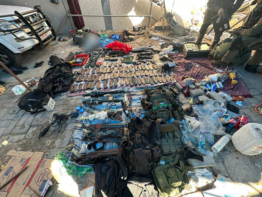 sentdefender's tweet photo. A Significant Stockpile of Weapons and Munitions were Discovered in Tunnels beneath the Al-Shifa Medical Complex today, following a Large-Scale Excavation in the Courtyard of the Hospital which began last night; these Excavations will continue within the Complex as additional Tunnels and Underground-Bases used by Hamas are Found.