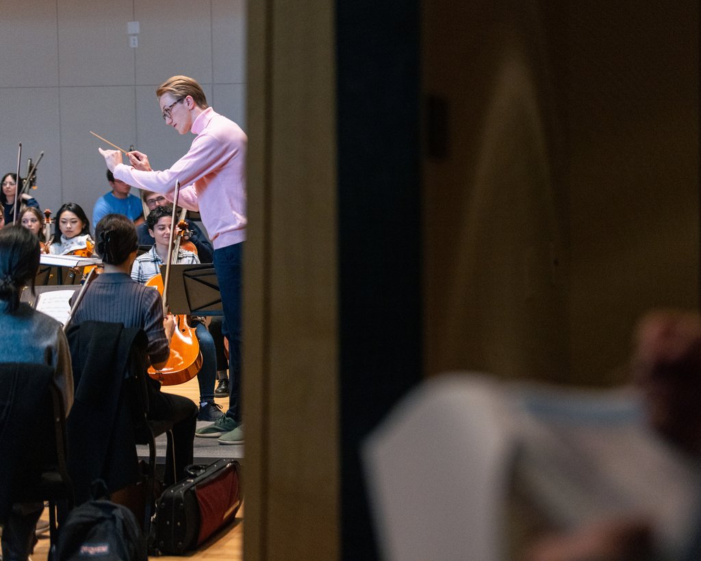 yalemusic's tweet photo. We recently watched conductor Sam Hollister '18BA '28DMA and the Yale Philharmonia rehearse Valerie Coleman's "Umoja: Anthem of Unity." Join us tonight for the orchestra's performance of that work and music by Adolphus Hailstork and Joan Tower! https://t.co/nbfkdp3ZPA https://t.co/zDPzt1gtfz