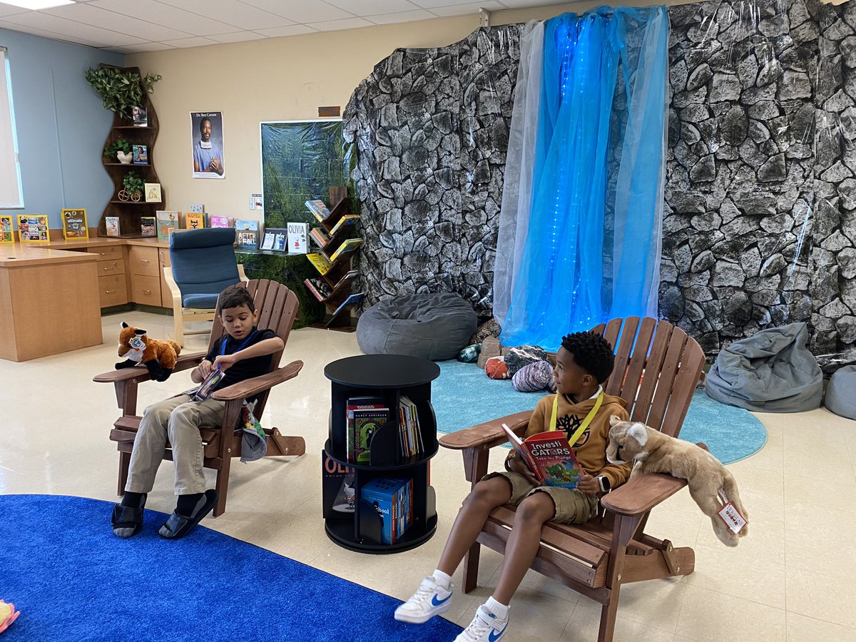 Kathy_Winne's tweet photo. What an exciting day @SeminoleTrails!We revealed our Ben Carson reading room, and the kids absolutely loved the books, seating and the reading buddies.  Thank you to all who played a part creating this space for our students. @STEPrincipalJJ @STES_Bush @Miss_Redlich @TaMiyahLowe https://t.co/DqqT8YMx0z