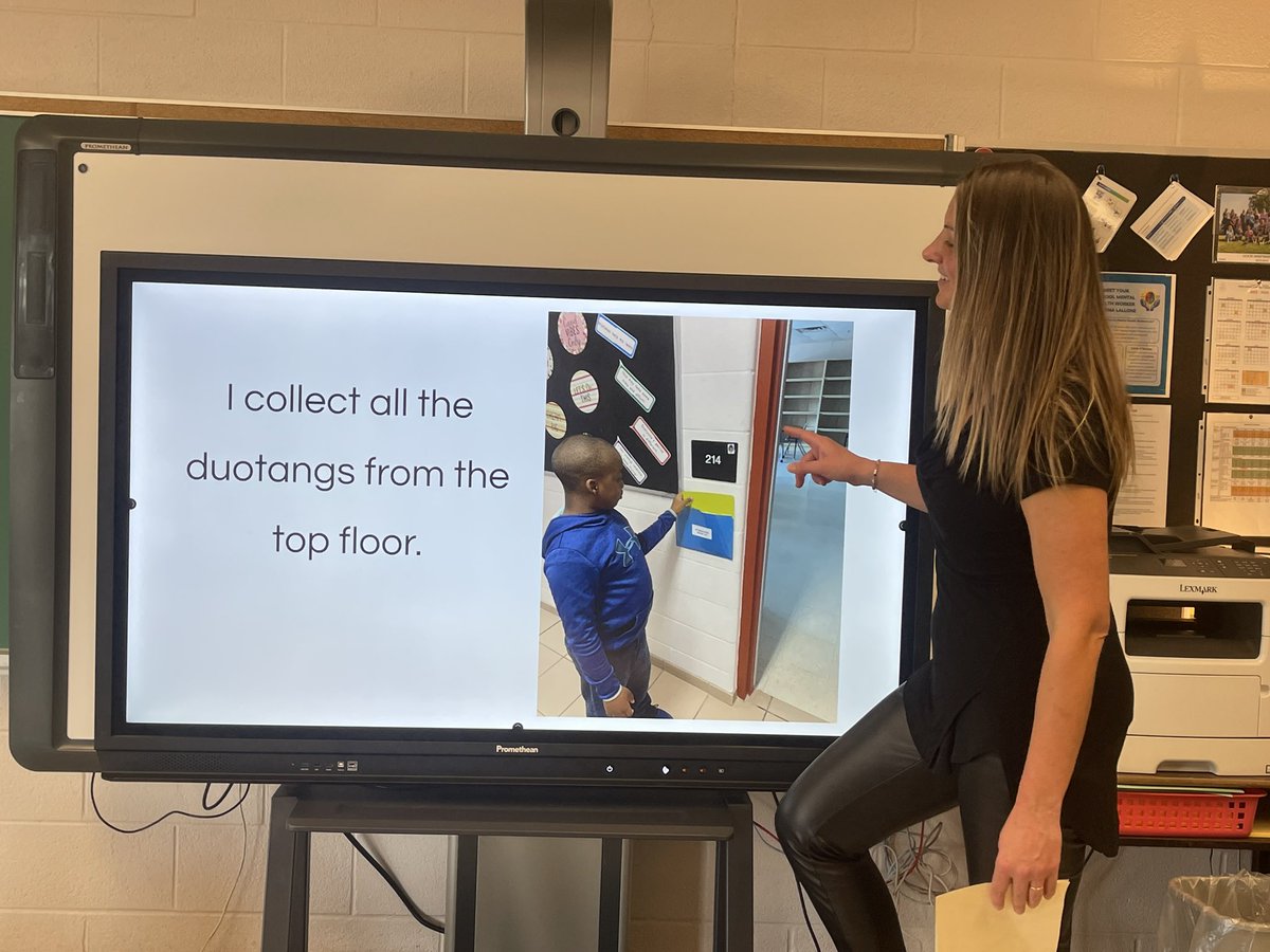 Ms_L_Taylor's tweet photo. @GSD_ycdsb APT Ms. H reading an experience journal that includes Ss pictures of themselves doing functional jobs like the Attendance Job. @YCDSB @SSD_YCDSB https://t.co/MUtB11no35
