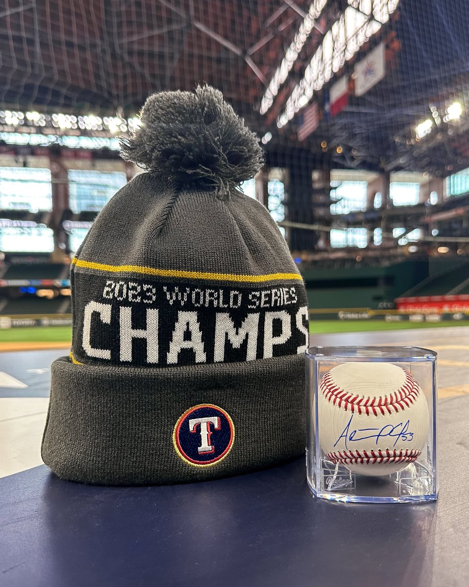 Repost for a chance to win this signed Adolis García baseball and World Series Championship beanie!