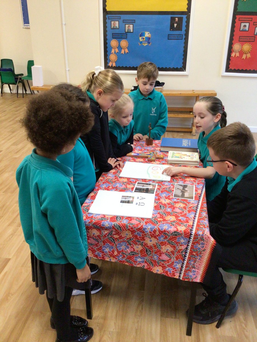 ClaveringSchool's tweet photo. To celebrate Interfaith Week, each class set-up a display table about a religion they have studied previously. The children throughout school visited the hall to see the displays that other year groups had created. https://t.co/uykPPJ6yMT