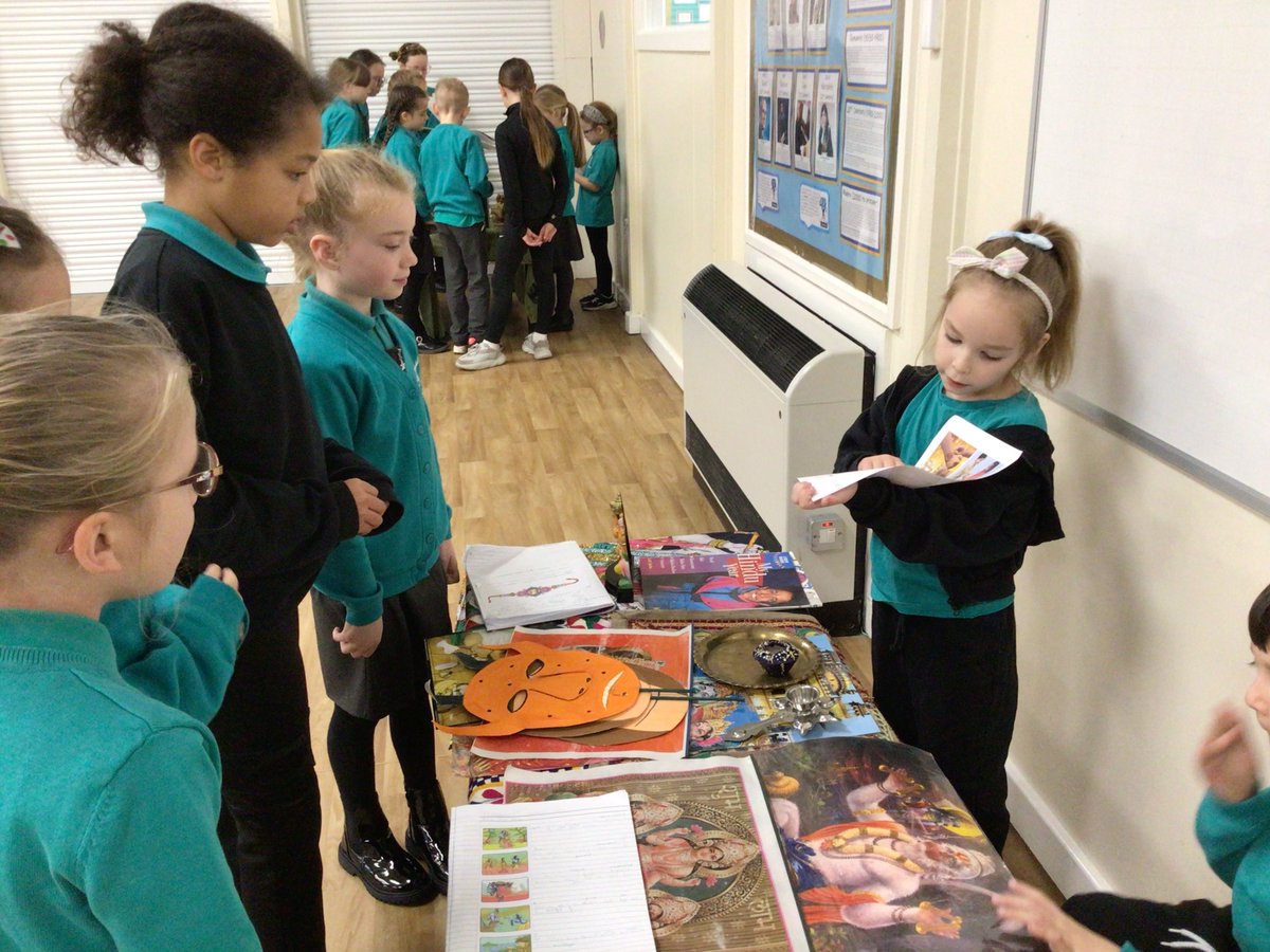 ClaveringSchool's tweet photo. To celebrate Interfaith Week, each class set-up a display table about a religion they have studied previously. The children throughout school visited the hall to see the displays that other year groups had created. https://t.co/uykPPJ6yMT