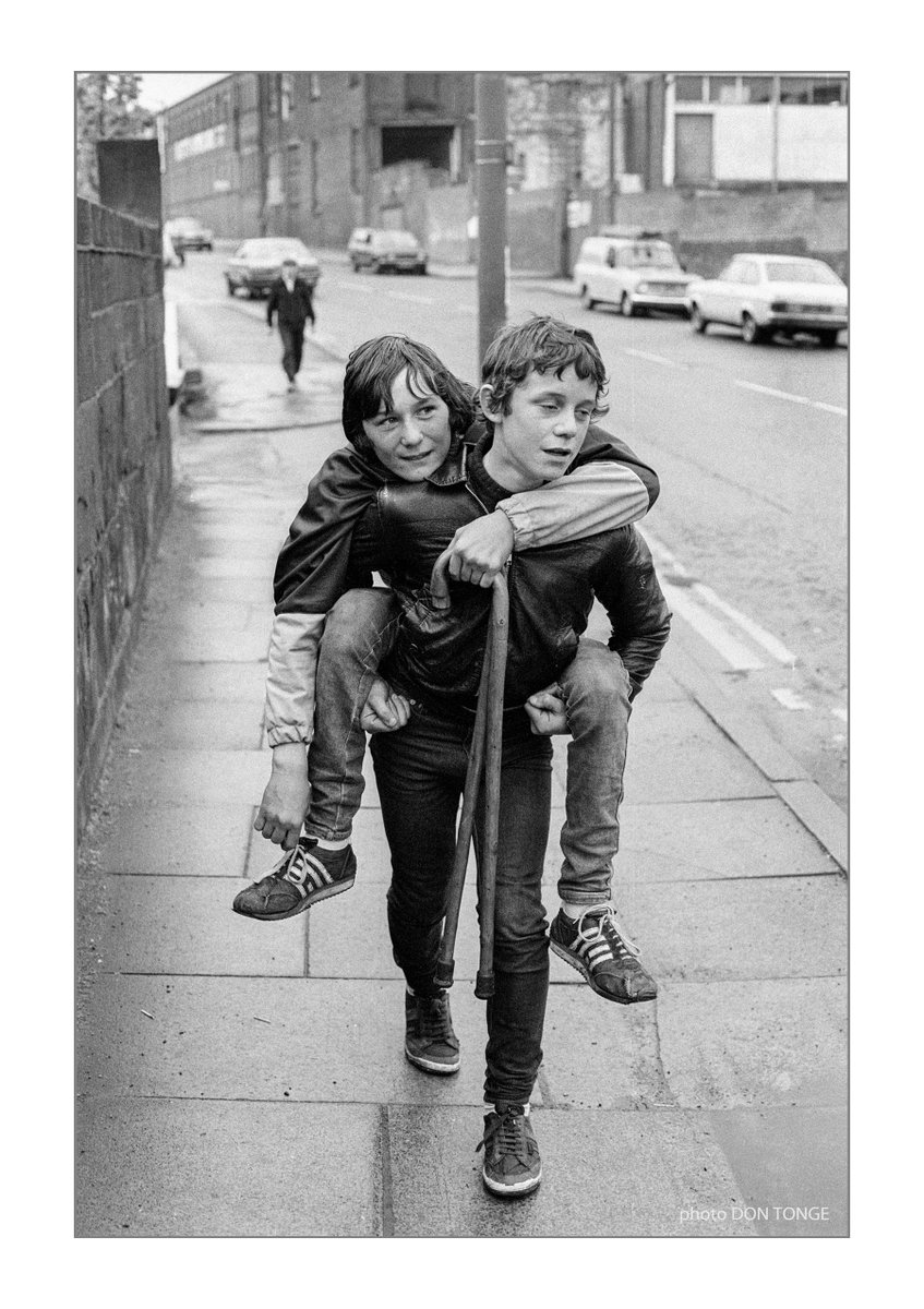 While going through my negs I came across another shot I took back in the 1970s of two boys coming down Chorley St in Bolton, I presume they were coming from the Royal Infirmary! #britishculturearchive #caferoyalbooks #blackandwhitephotography #monochrome #filmphotography