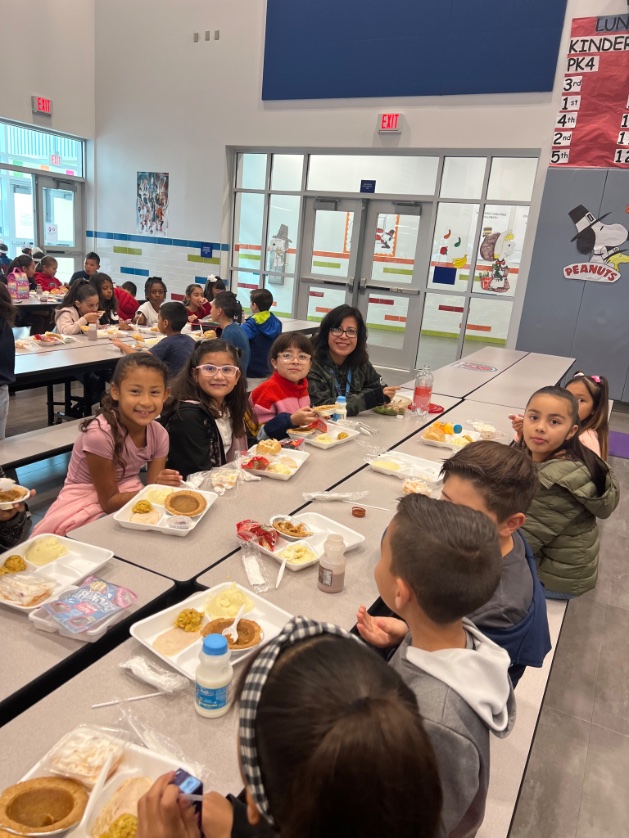 YAY!  Ms. @pvelar01_JCE and Ms.  Tejeda eat Thanksgiving lunch with their 3rd graders!  🦬❤️ #TeamSISD