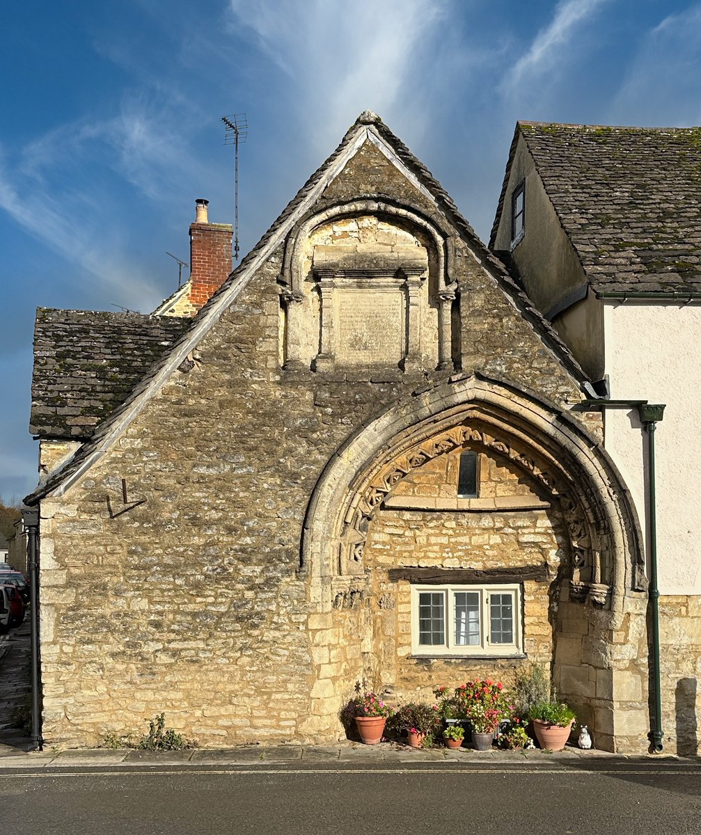 Perhaps one of the most enigmatic gables in the country: St. John's Court in Malmesbury is a C17th almshouse which incorporates a beautiful C12th doorway from a former chapel on the site. Lovely example of Cotswold vernacular building.