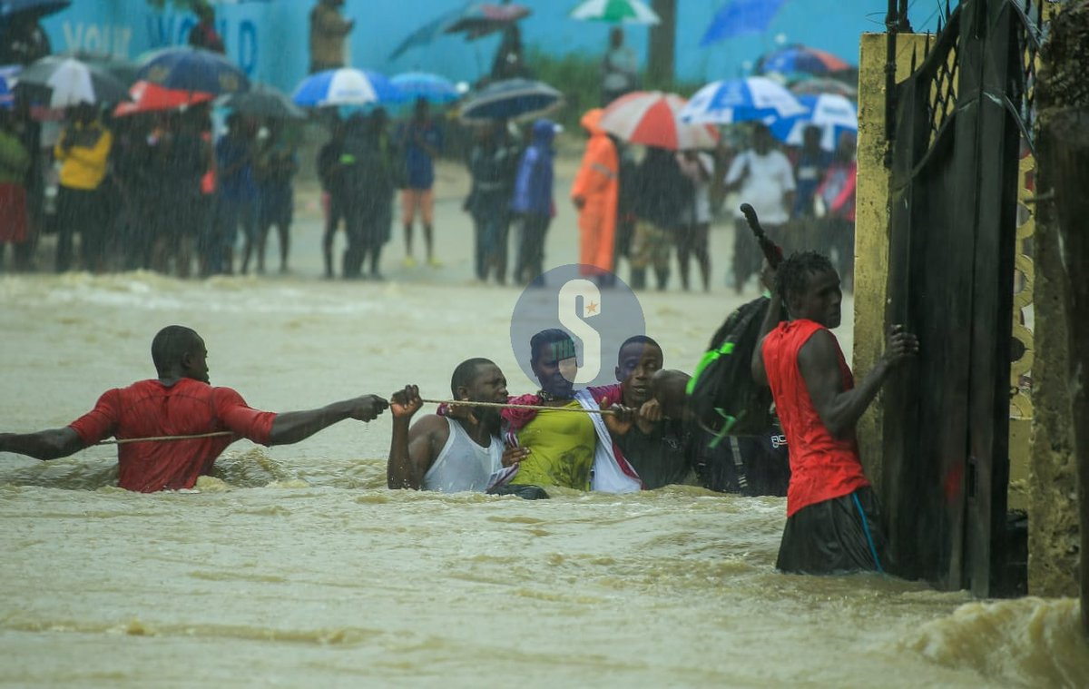 TheStarKenya's tweet photo. Commuters forced to swim to safer grounds following heavy downpour in Mombasa on Friday, November 17.

📸 John Chesoli