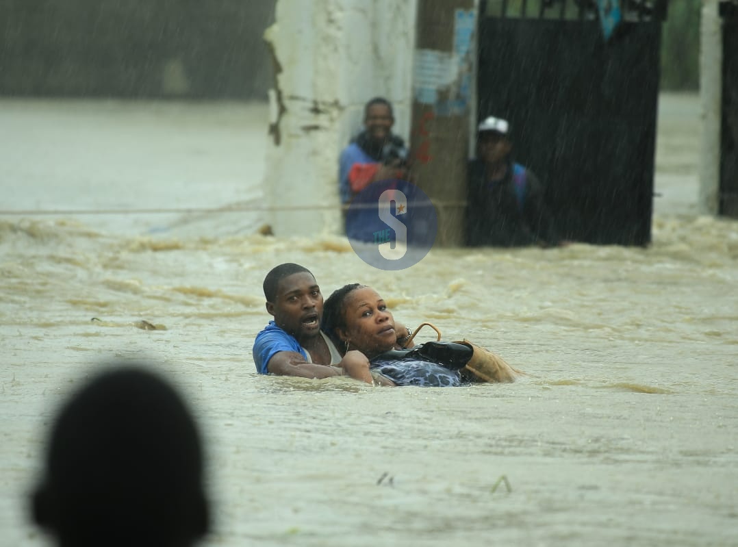 TheStarKenya's tweet photo. Commuters forced to swim to safer grounds following heavy downpour in Mombasa on Friday, November 17.

📸 John Chesoli