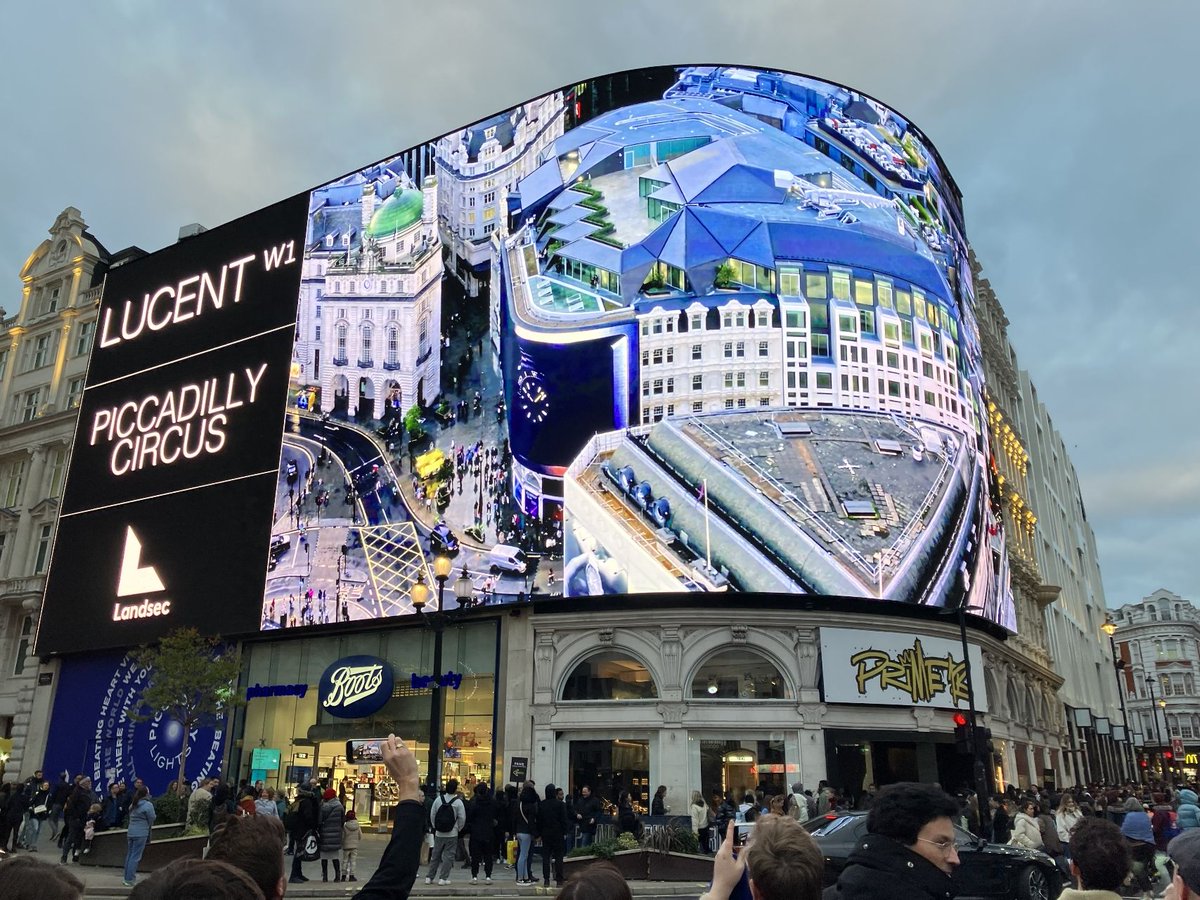 Stantec's tweet photo. This time last week, our team was standing proud at the Piccadilly Lights in London as our client @LandsecGroup took over the iconic light display to launch Lucent W1! Read about our #Landscape team’s involvement in this project here: https://t.co/U3bGoMS7Ui #CommunityDevelopment https://t.co/lXD4iMCuMr